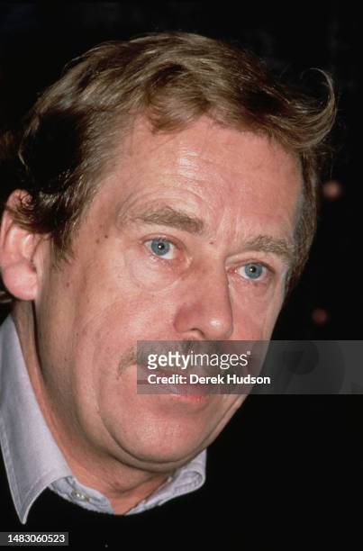 Czech writer, dissident, and statesman Václav Havel talks to journalists whilst people demonstrate in Wenceslas Square for greater liberty and the...