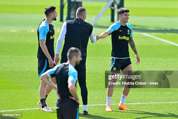 Samir Handanovic of FC Internazionale and Joaquin Correa of FC Internazionale in action during the FC Internazionale training session at the club's...