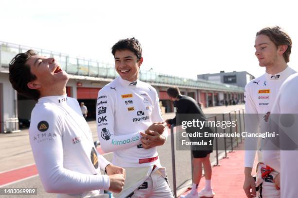 Josep Maria Marti of Spain and Campos Racing talks to Alejandro Garcia of Mexico and Jenzer Motorsport and Christian Mansell of Great Britain and...