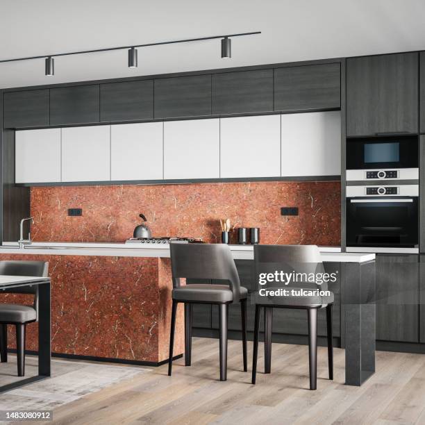 black modern minimalist kitchen with long island with stools. dark materials. - dark marble table stock pictures, royalty-free photos & images