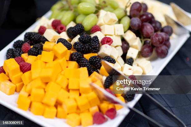 cheese and fruit tray for the peckish - cheese cubes stock pictures, royalty-free photos & images