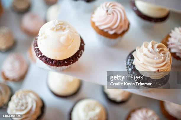so many cupcakes - banana cream cake stock pictures, royalty-free photos & images