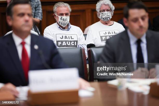 Members of the audience listen as former Director of National Intelligence John Ratcliffe and former Deputy Assistant Secretary of State for East...