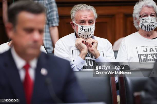 Members of the audience listen as former Director of National Intelligence John Ratcliffe testifies before the House Select Subcommittee on the...