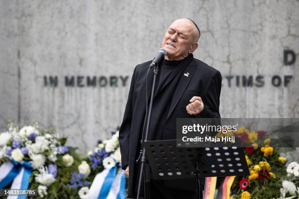 Israeli singer Shlomi Shabat preforms at a ceremony to commemorate Yom HaShoa, or Holocaust Remembrance Day, at the Sachsenhausen concentration camp...