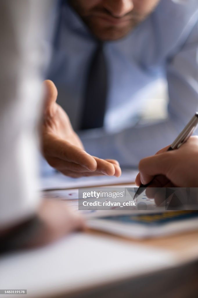Business accounting concept, Business man using calculator with computer laptop, budget and loan paper in office.