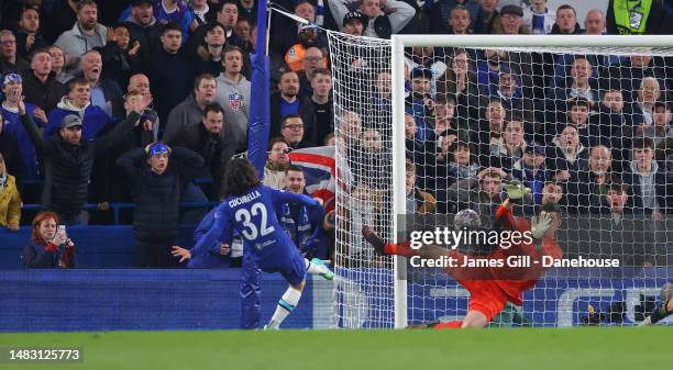 Thibaut Courtois of Real Madrid makes a save from Marc Cucurella of Chelsea FC during the UEFA Champions League quarterfinal second leg match between...