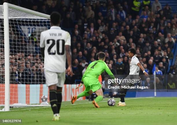 Rodrygo of Real Madrid scores the team's second goal past Kepa Arrizabalaga of Chelsea during the UEFA Champions League quarterfinal second leg match...