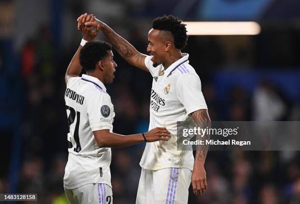Rodrygo of Real Madrid celebrates with Eder Militao after scoring the team's second goal during the UEFA Champions League quarterfinal second leg...