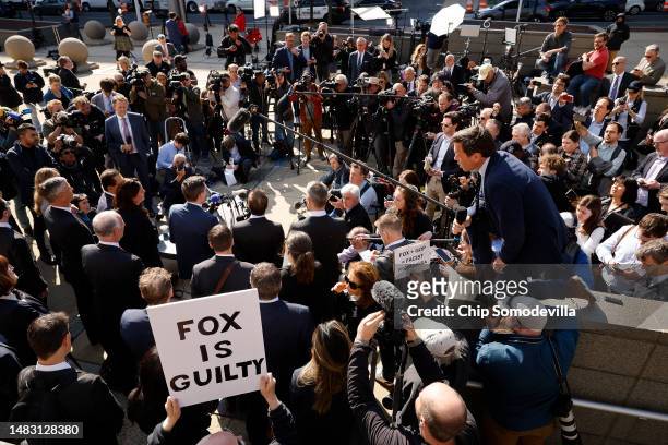 Lawyers representing Dominion Voting Systems talk to reporters outside the Leonard Williams Justice Center following a settlement with FOX News in...