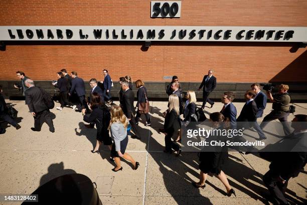 Lawyers representing Dominion Voting Systems leave the Leonard Williams Justice Center following a settlement with FOX News in Delaware Superior...