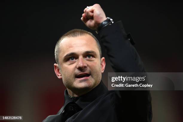 Shaun Maloney, Manager of Wigan Athletic, celebrates victory in front of their fans after defeating Stoke City during the Sky Bet Championship match...