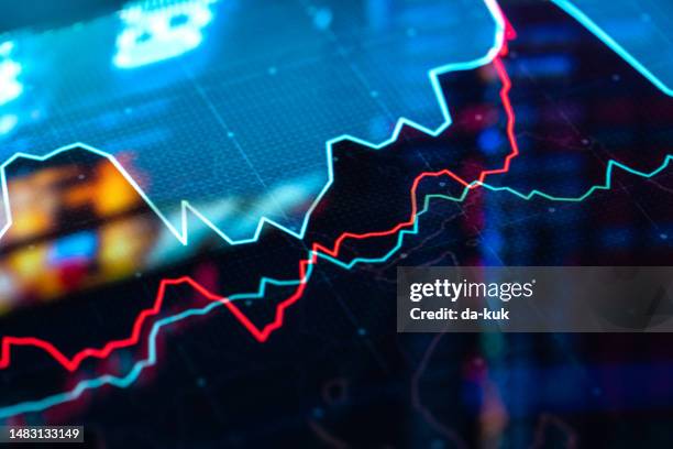 trading charts and graph data on lcd close-up - forex stockfoto's en -beelden