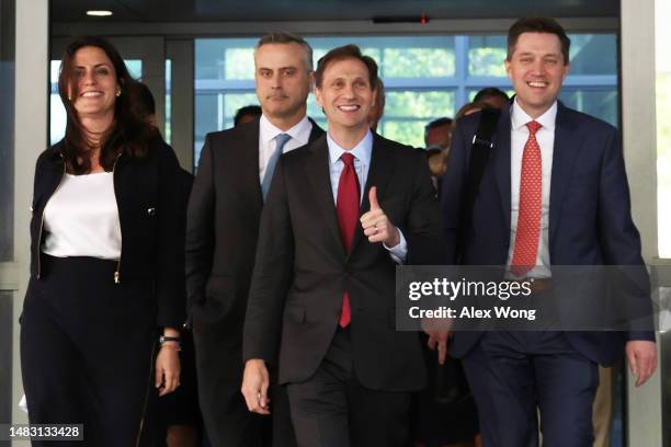 Dominion Voting Systems CEO John Poulos leaves with members of his legal team, including Davida Brook , Justin Nelson and Stephen Shackelford from...