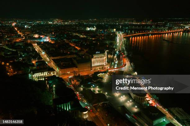 aerial view of illuminated night kyiv city at night - kyiv night stock pictures, royalty-free photos & images