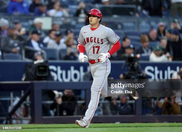 Shohei Ohtani of the Los Angeles Angels heads for home after he hit a two run home run in the first inning against the New York Yankees at Yankee...