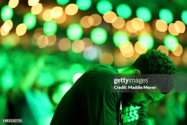 Jayson Tatum of the Boston Celtics look on from the bench before Game Two of the Eastern Conference First Round Playoffs between the Boston Celtics...