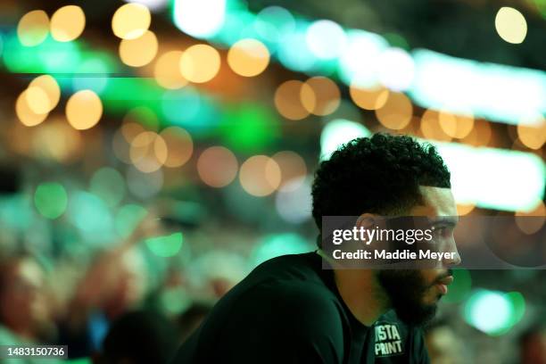 Jayson Tatum of the Boston Celtics look on from the bench before Game Two of the Eastern Conference First Round Playoffs between the Boston Celtics...