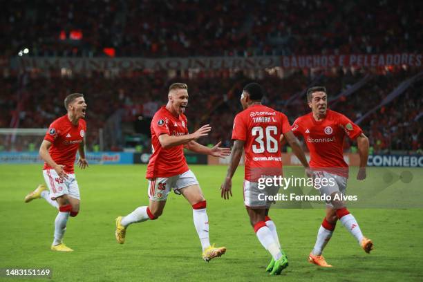 Alexandre Alemao of Internacional celebrates with teammates after scoring the team's first goal during a Copa CONMEBOL Libertadores 2023 group B...