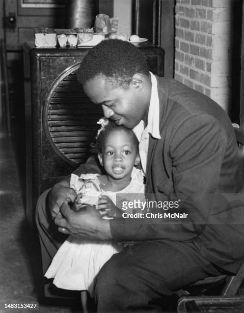 Denise McNair, one of the victims of the 16th Street Baptist Church bombing poses with her father Chris McNair circa 1954 in Birmingham, Alabama.
