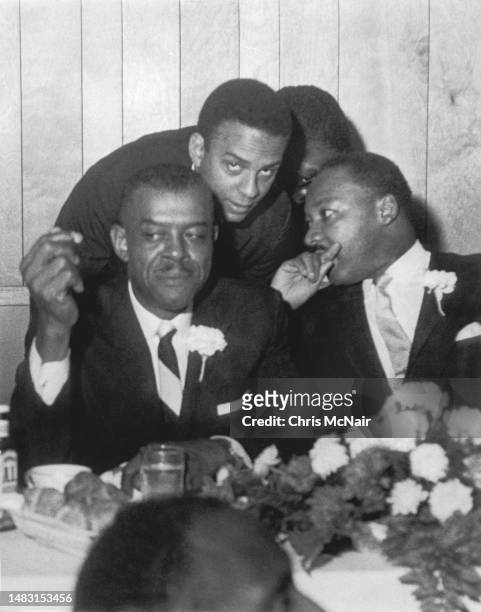 Dr Martin Luther King in a huddle with Georgia State Senator Johnson and Andrew Young at the SCLC Conference on August 8, 1965 in Birmingham, Alabama