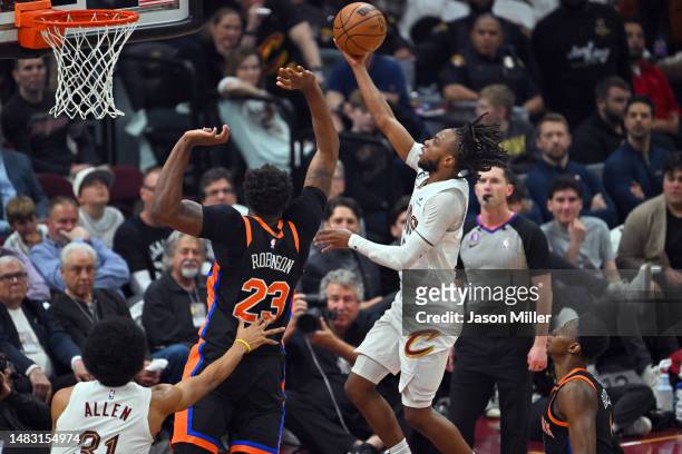Darius Garland of the Cleveland Cavaliers shoots over Mitchell Robinson of the New York Knicks during the second quarter of Game Two of the Eastern...
