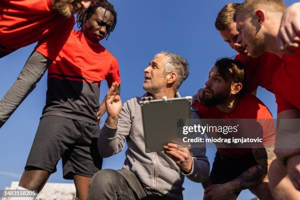 rugby team on time out - rugby game stock pictures, royalty-free photos & images