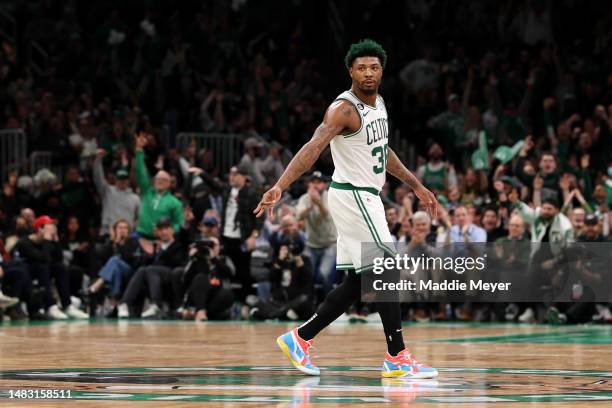 Marcus Smart of the Boston Celtics celebrates during the fourth quarter of Game Two of the Eastern Conference First Round Playoffs between the Boston...