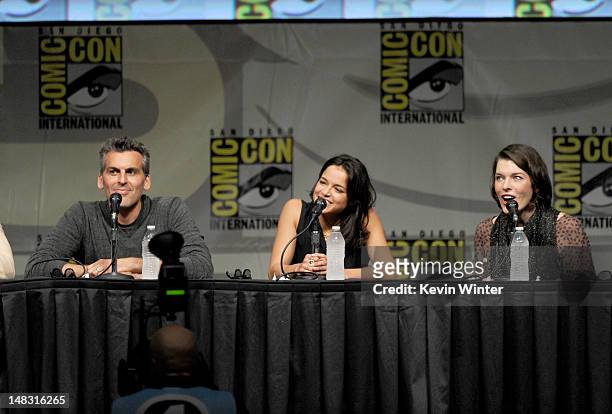 Actors Oded Fehr, Michelle Rodriguez, and Milla Jovovich speak at the Screen Gems' "Resident Evil: Retribution" panel during Comic-Con International...