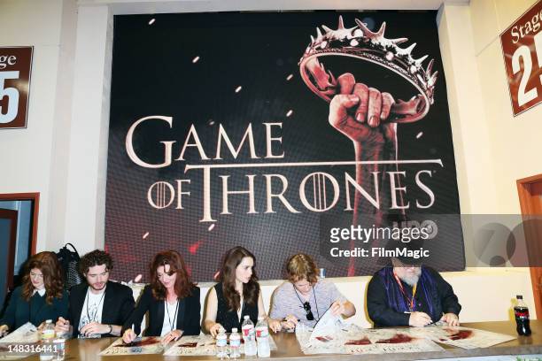 The cast sign autographs during HBO's "Game Of Thrones" during Comic-Con International 2012 at San Diego Convention Center on July 13, 2012 in San...