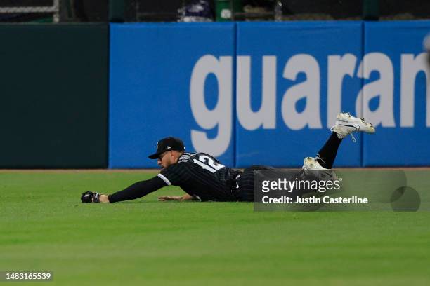 Romy Gonzalez of the Chicago White Sox makes a diving catch in the seventh inning in the game against the Philadelphia Phillies during game two of a...