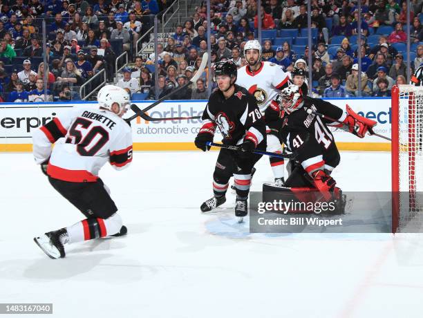 Maxence Guenette of the Ottawa Senators skates in his NHL game against Jacob Bryson and Craig Anderson of the Buffalo Sabres on April 13, 2023 at...