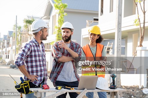 Engineer and architect is inspecting construction and quality assurance new house.