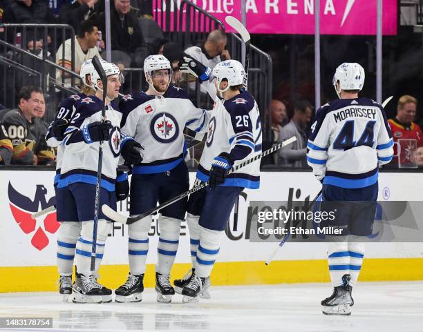 The Winnipeg Jets celebrate a second-period goal by Pierre-Luc Dubois against the Vegas Golden Knights during of Game One of the First Round of the...