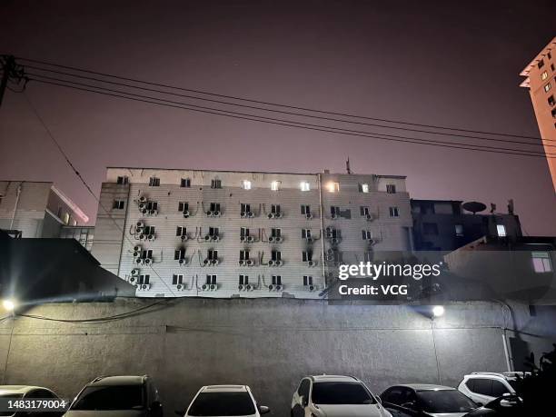 Damaged building is seen at Beijing Changfeng Hospital following a fire on April 18, 2023 in Beijing, China. Twenty-one people have died following...