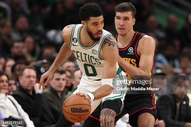 Bogdan Bogdanovic of the Atlanta Hawks defends Jayson Tatum of the Boston Celtics during the second quarter of Game Two of the Eastern Conference...