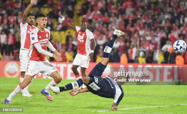 Cristian Tarragona of Gimnasia makes an overhead kick against Santa Fe during the Copa CONMEBOL Sudamericana 2023 group G match between Independiente...