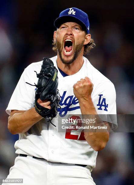 Clayton Kershaw of the Los Angeles Dodgers reacts after making the third out against the New York Mets in the seventh inning at Dodger Stadium on...
