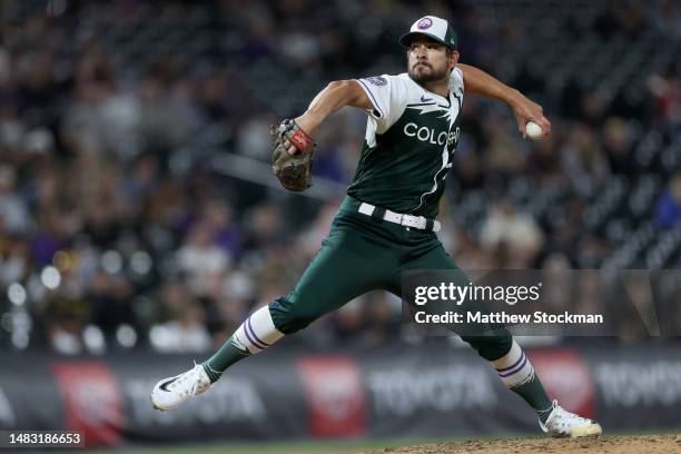 Pitcher Brad Hand of the Colorado Rockies throws against the Pittsburgh Pirates in the eighth inning at Coors Field on April 18, 2023 in Denver,...