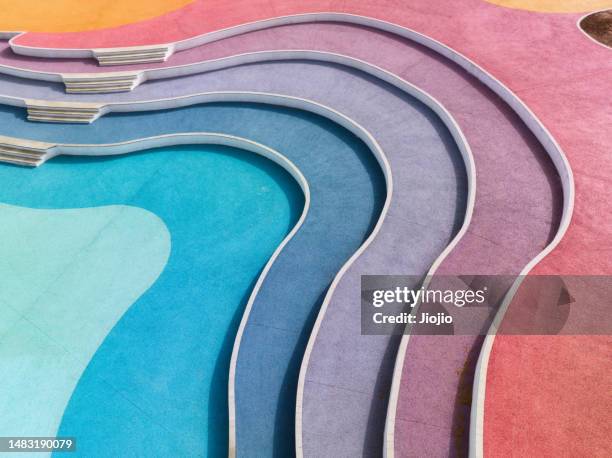 multicolor street in town square - dynamic architecture stock pictures, royalty-free photos & images