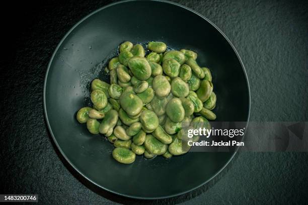 sauteed broad beans - fava bean stock pictures, royalty-free photos & images