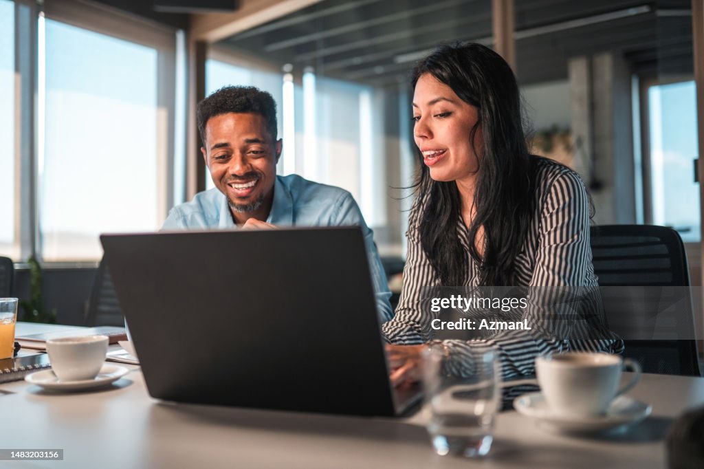 Smart Business Woman and Man Discussing Ideas