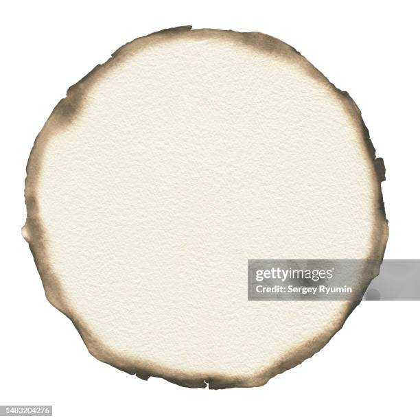 burnt edges paper in the shape of circle isolated on white background. - burnt stock pictures, royalty-free photos & images