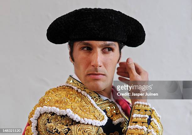 Bullfighter waits before entering the bullring for a bullfight on the fourth day of the San Fermin running-of-the-bulls on July 10, 2012 in Pamplona,...