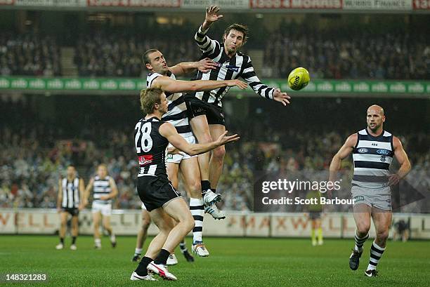 Dale Thomas of the Magpies competes for the ball during the AFL Round 16 game between the Geelong Cats and the Collingwood Magpies at the Melbourne...