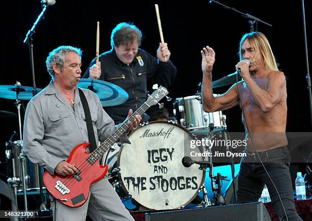 Mike Watt, Toby Dammit and Iggy Pop of The Stooges perform live on stage during the first day of Hard Rock Calling, at Hyde Park on July 13, 2012 in...