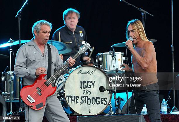 Mike Watt, Toby Dammit and Iggy Pop of The Stooges perform live on stage during the first day of Hard Rock Calling, at Hyde Park on July 13, 2012 in...