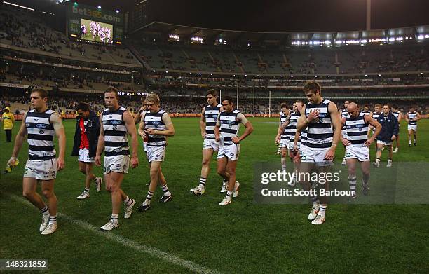 The Cats leave the ground after losing the AFL Round 16 game between the Geelong Cats and the Collingwood Magpies at the Melbourne Cricket Ground on...