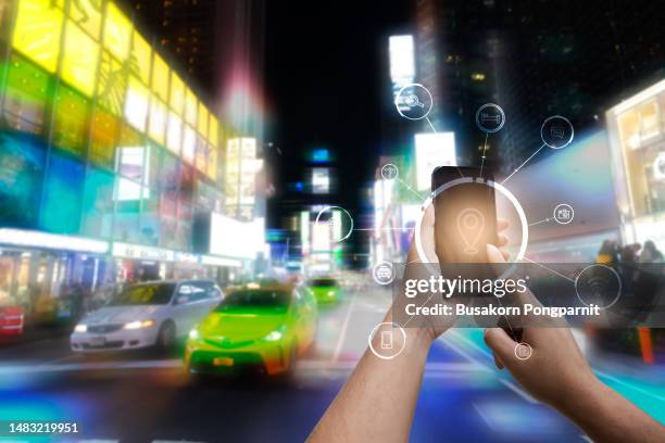 hand holding smart phone use ar application to check relevant information about the spaces around customer. - augmented reality retail stock pictures, royalty-free photos & images