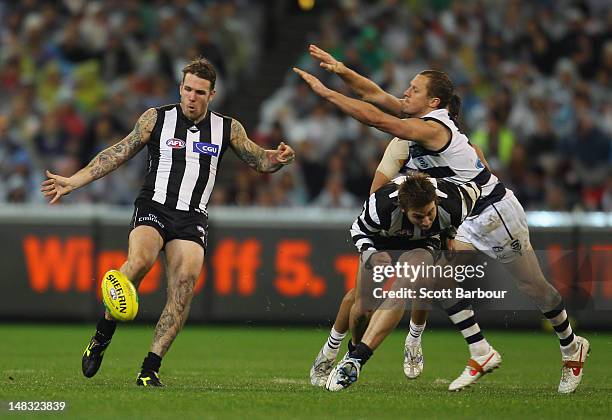 Dane Swan of the Magpies kicks the ball during the AFL Round 16 game between the Geelong Cats and the Collingwood Magpies at the Melbourne Cricket...